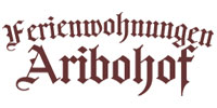Logo von Aribohof Ferienwohnungen Inh. Fritz Lackerbauer